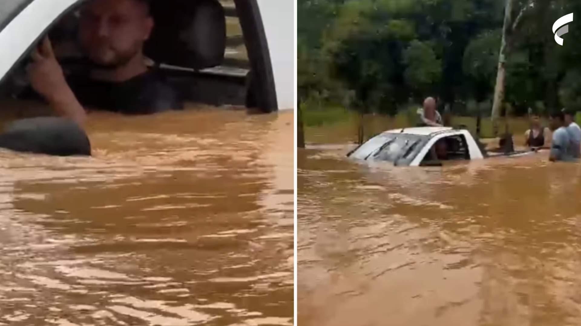 Carro fica debaixo d'água após chuvas em Governador Lindenberg no ES